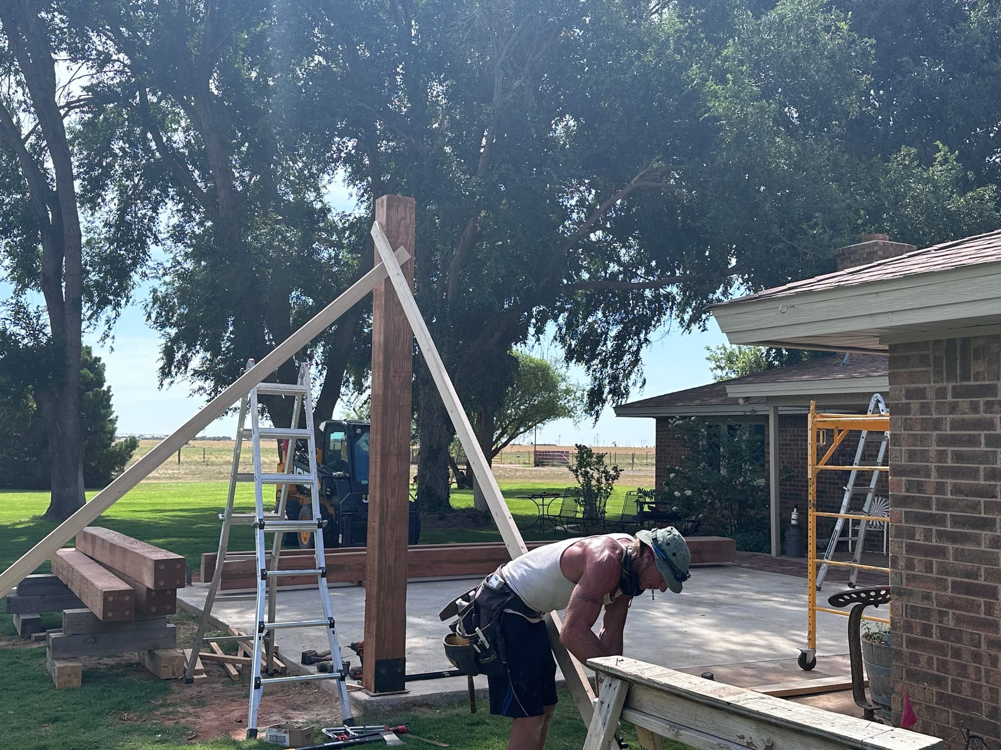 First pavilion post set and braced off the new slab