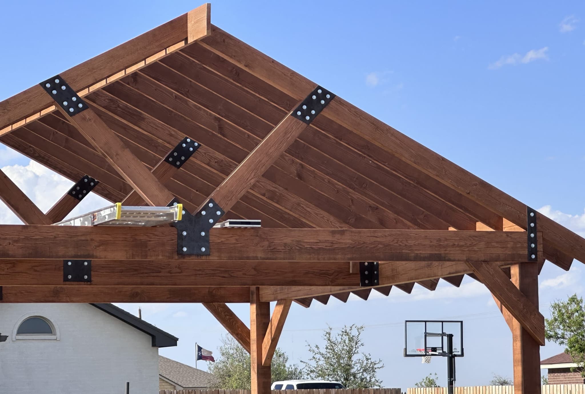 Exposed purlins and rafter tails on the pavilion roof