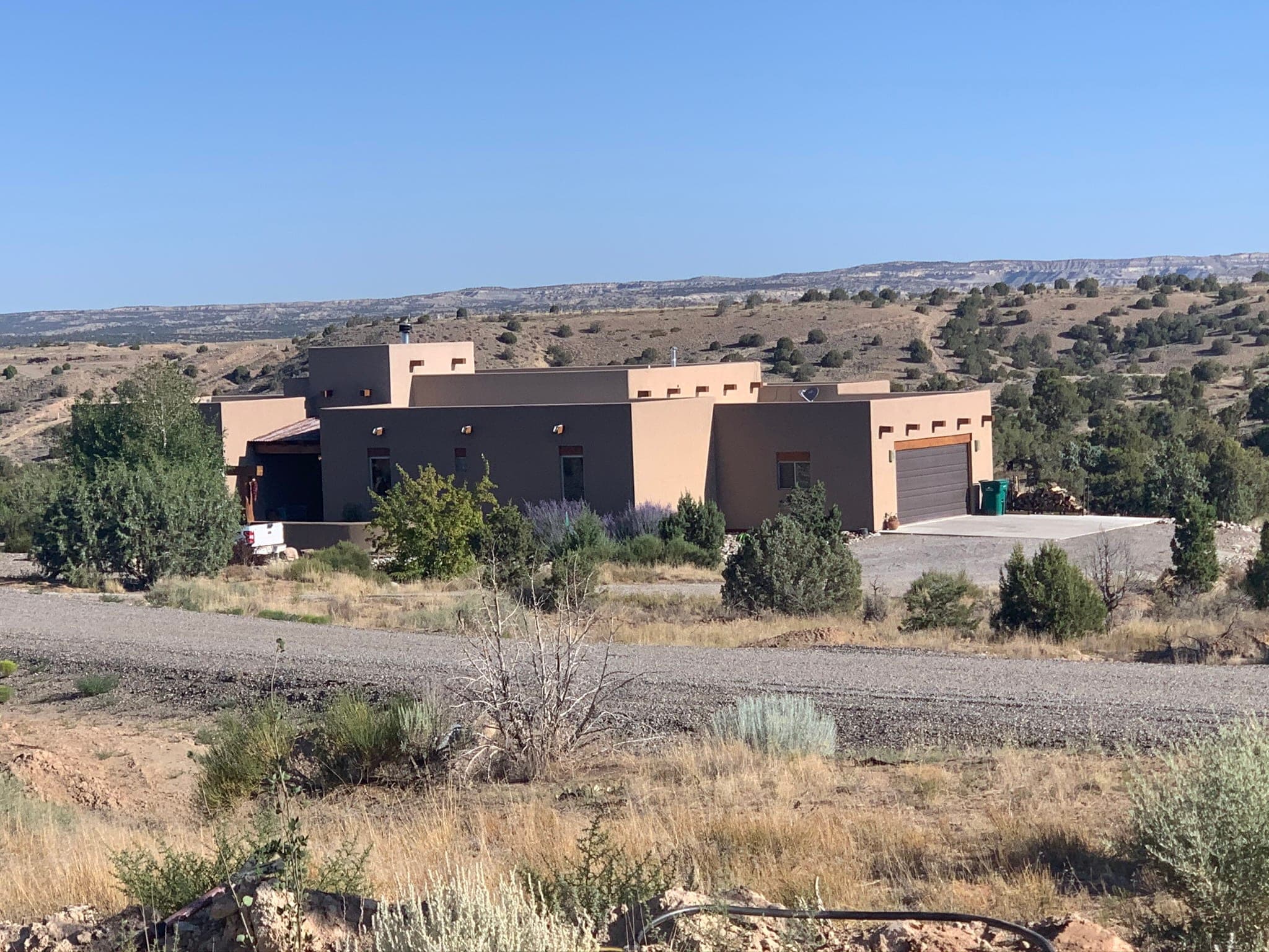 Santa Fe ranch custom home with double exterior walls