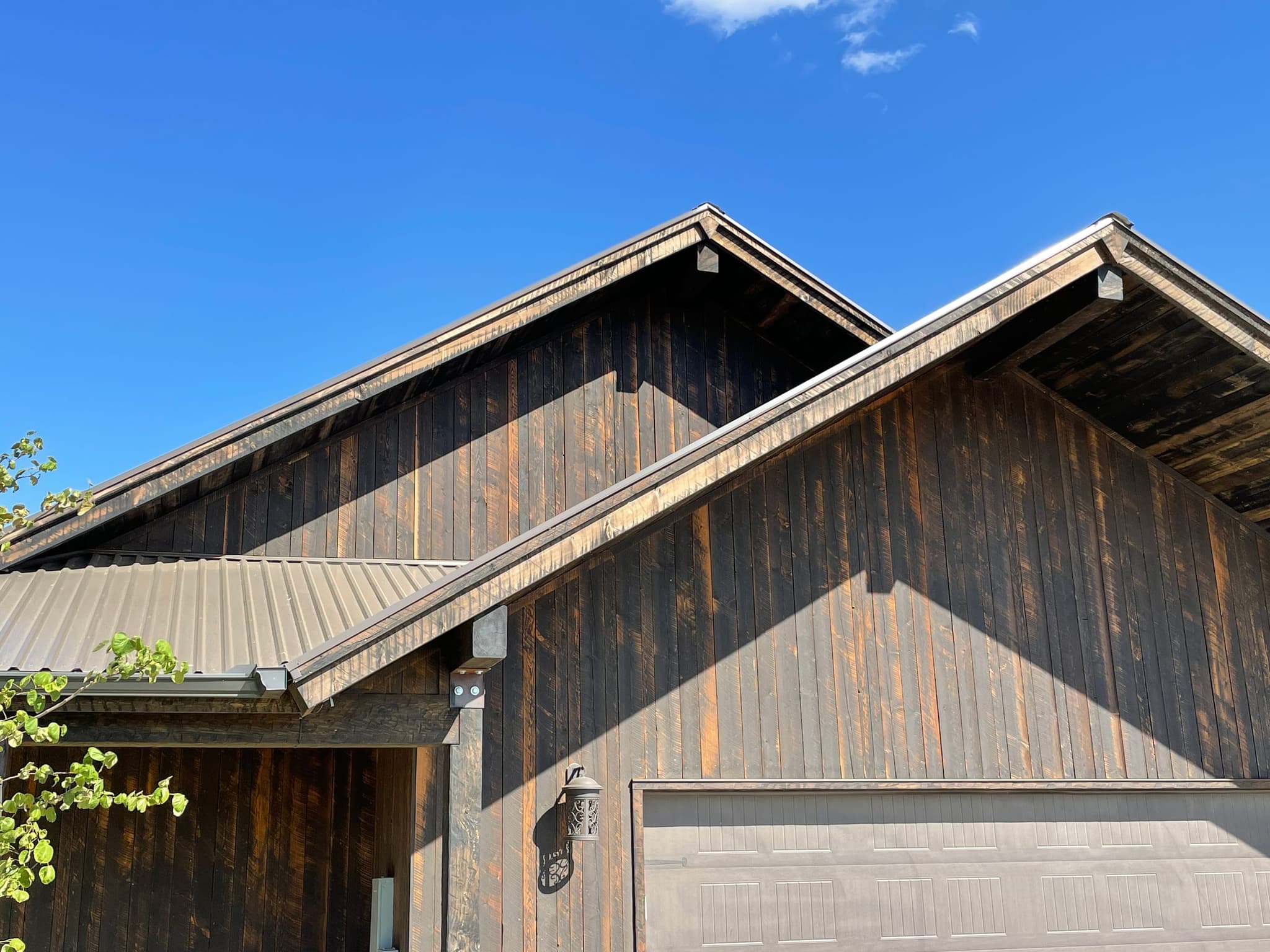 A signature Everett Building Co detail — timber and metal panel on a finished elevation